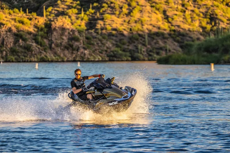 Slide: The Image of Person riding 2023 Kawasaki JET SKI ULTRA 160LX on a lake. - 7