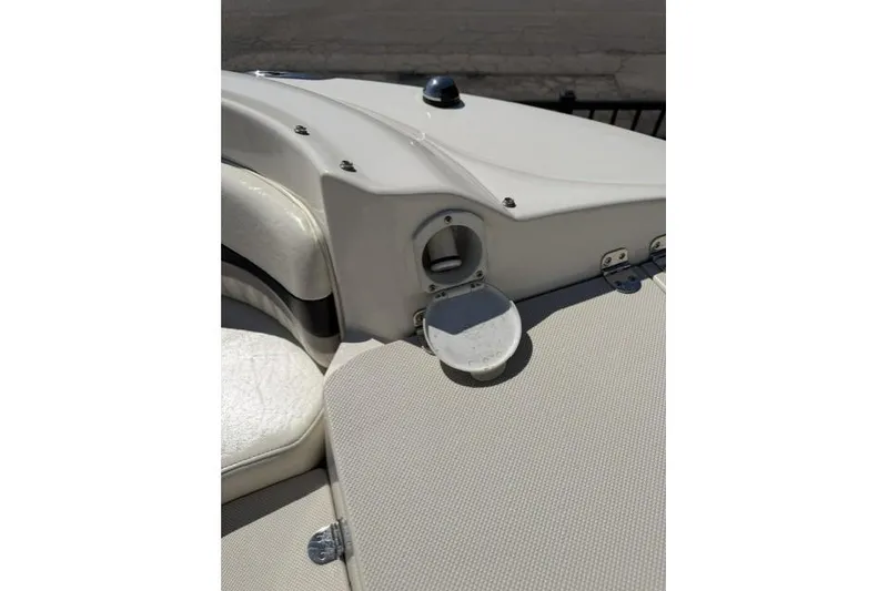 Slide: The Image of 2012 Stingray 235 LR boat interior detail with open compartment. - 18