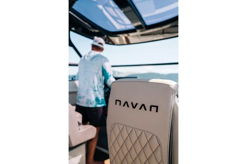 Slide: The Image of Navan S30 boat 2026 with driver in background. - 12