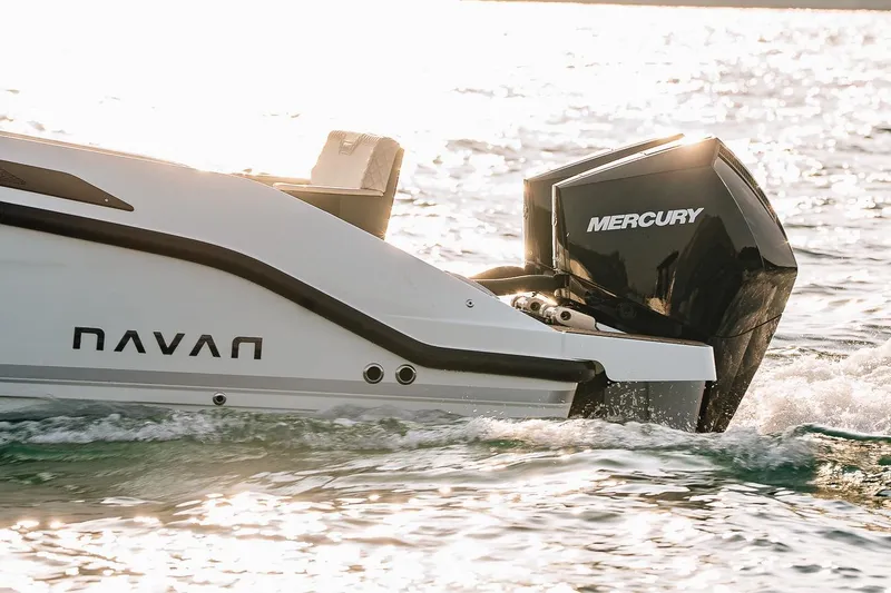 Slide: The Image of Navan S30 boat 2026 with Mercury outboard motor on water. - 25