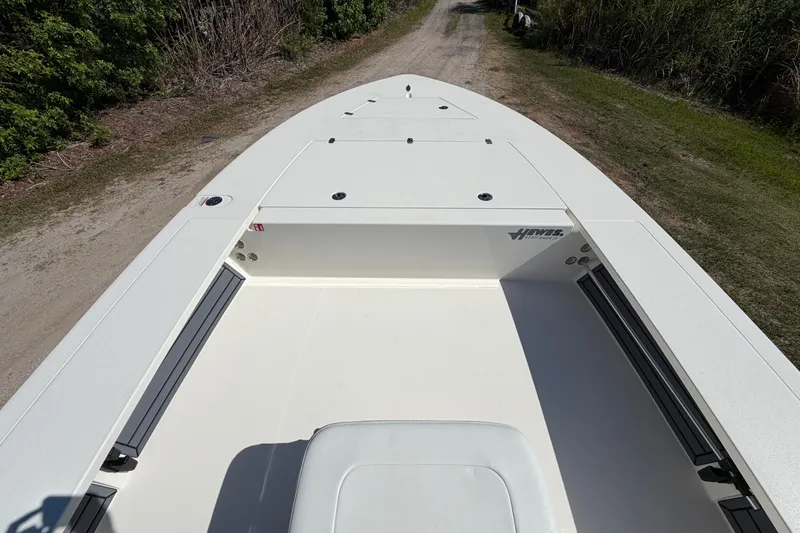 Slide: The Image of 2026 Hewes Redfisher 21 boat deck, showcasing spacious and sleek design. - 19