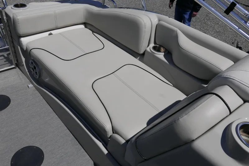 Slide: The Image of Luxurious seating on 2018 Sylvan S-3 boat with cup holders and speaker. - 10