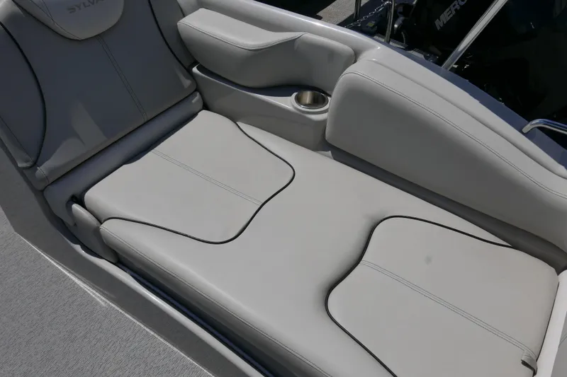 Slide: The Image of Luxurious seating on 2018 Sylvan S-3 boat with cup holder and armrest. - 11