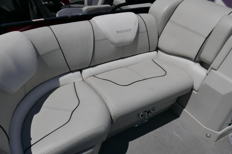 Slide: The Image of Luxurious beige seating on a 2018 Sylvan S-3 boat, showcasing comfort and style. - 4