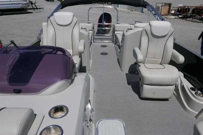 Slide: The Image of Luxurious 2018 Sylvan S-3 boat interior with plush seating and modern design. - 7