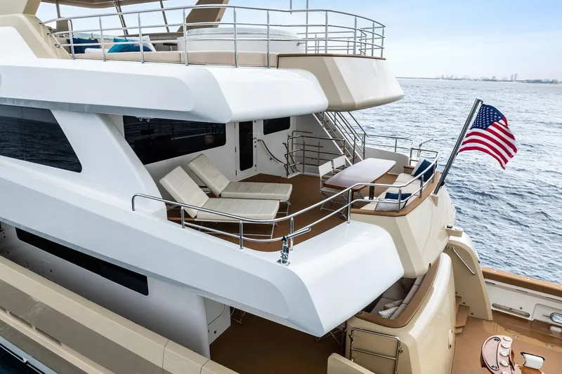 Slide: The Image of Bridge Afterdeck with chaise loungers, aft settee, table - 3