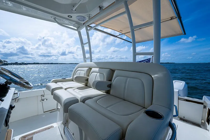 Slide: The Image of Luxurious seating on 2019 Hinckley Sport Boat 40 C, cruising on a sunny day. - 11