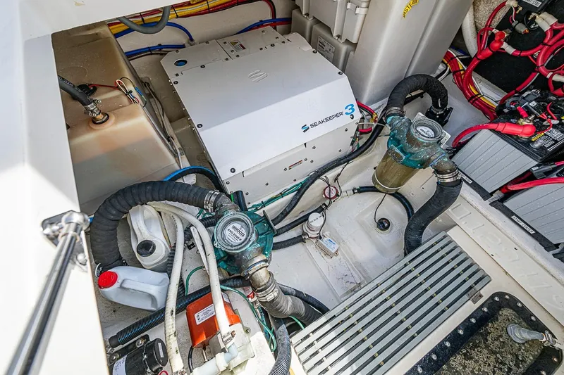 Slide: The Image of Engine compartment of 2019 Hinckley Sport Boat 40 C with Seakeeper 3 stabilizer system. - 26