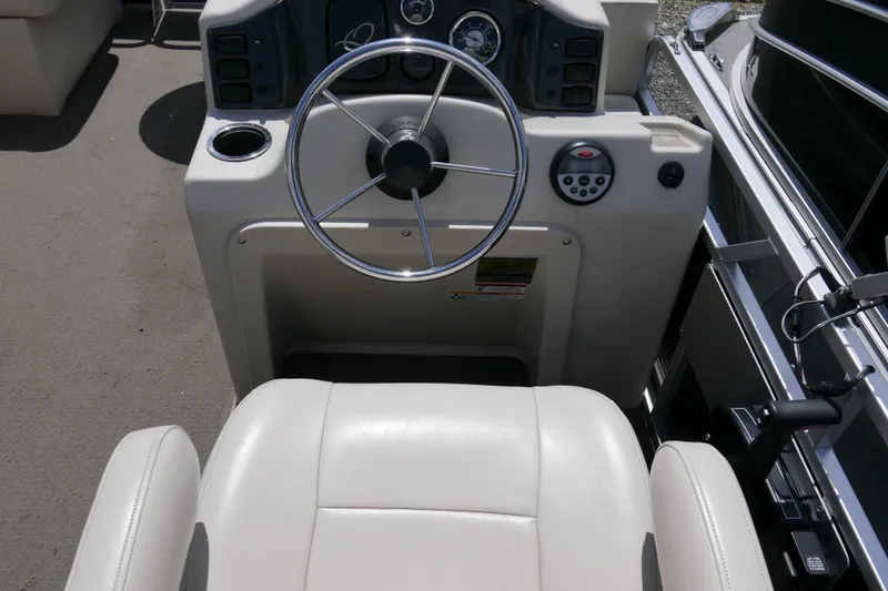 Slide: The Image of Steering console of 2011 Apex Marine Qwest Adventure 16 pontoon boat. - 11