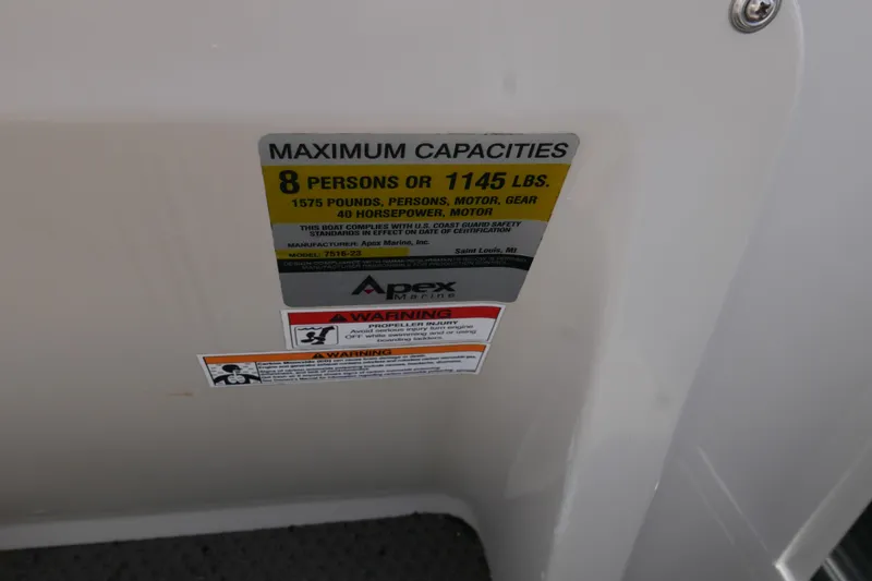 Slide: The Image of 2011 Apex Marine Qwest Adventure 16 capacity label, 8 persons or 1145 lbs limit. - 14
