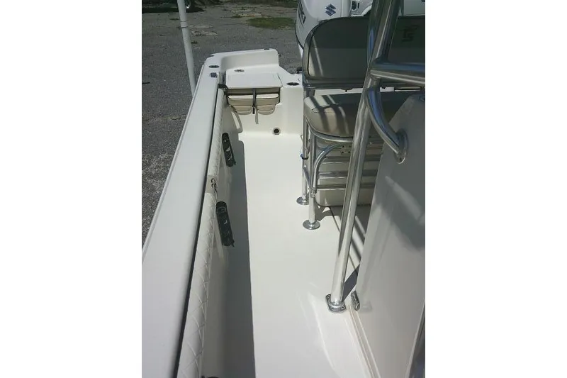 Slide: The Image of 2021 Carolina Skiff 23 LS boat interior with seating and railing. - 17