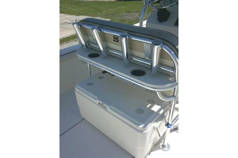 Slide: The Image of 2021 Carolina Skiff 23 LS boat with rod holders and cooler storage. - 25