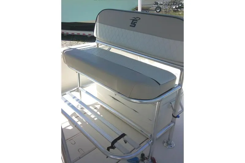 Slide: The Image of 2021 Carolina Skiff 23 LS boat seat with aluminum frame and cushioned backrest. - 31