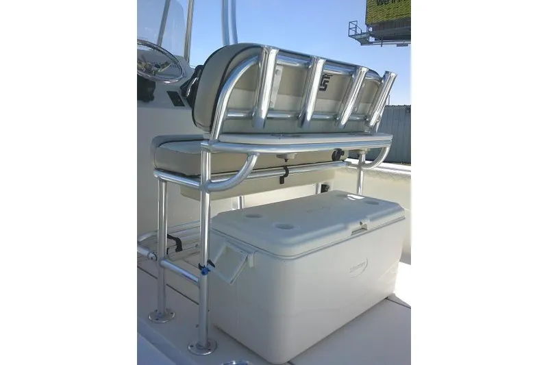 Slide: The Image of 2021 Carolina Skiff 23 LS boat seat with rod holders and cooler storage. - 35