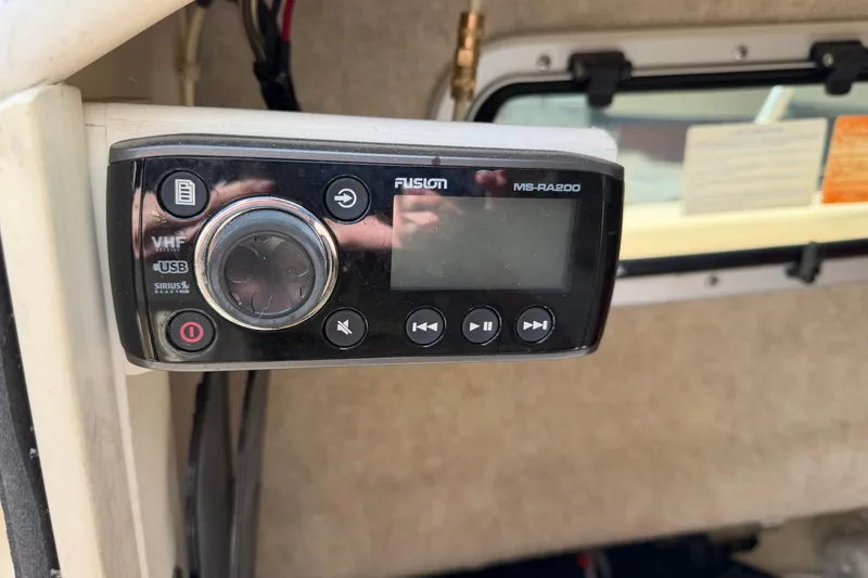 Slide: The Image of Fusion MS-RA200 stereo system on 2011 Grady-White Adventure 208 boat dashboard. - 7