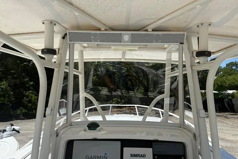 Slide: The Image of 2003 Jupiter 31 Cuddy boat helm with Garmin and Simrad electronics. - 20