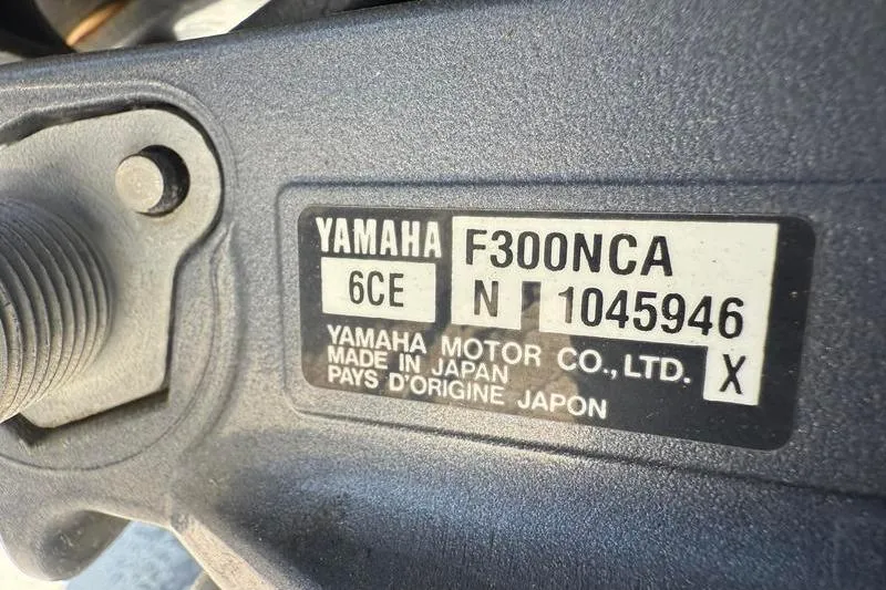 Slide: The Image of Yamaha F300NCA engine label on 2003 Jupiter 31 Cuddy boat, made in Japan. - 44