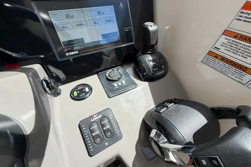 Slide: The Image of Control panel of 2018 Pursuit OS 355 Offshore boat with Yamaha display and controls. - 21