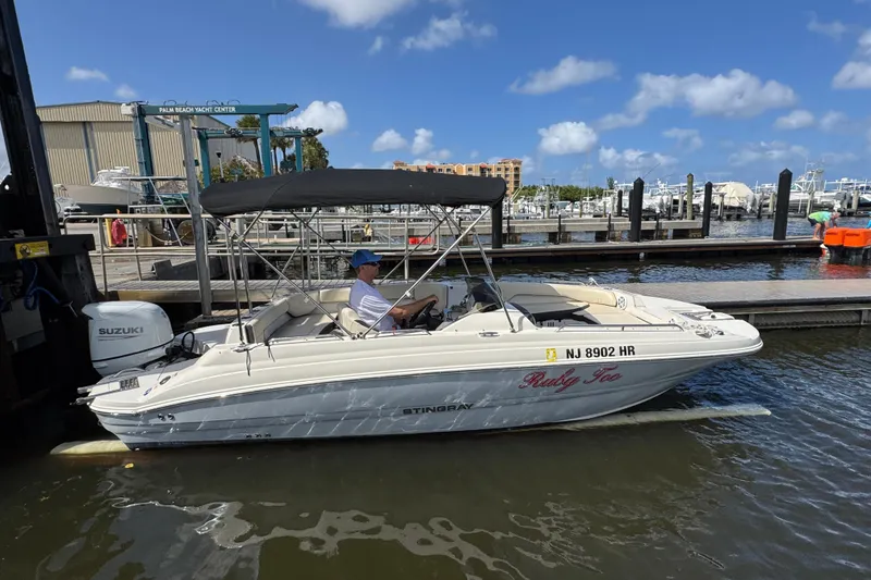 Slide: The Image of 2022 Stingray 192 SC boat docked at Palm Beach Yacht Center. - 3