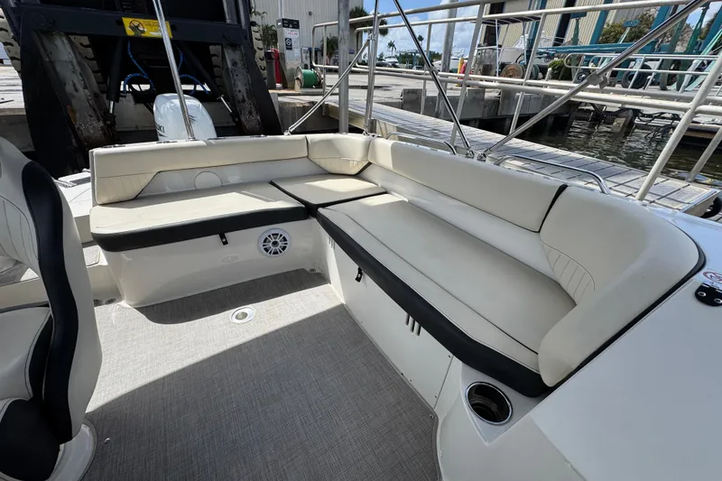 Slide: The Image of 2022 Stingray 192 SC boat interior with spacious seating and modern design. - 9