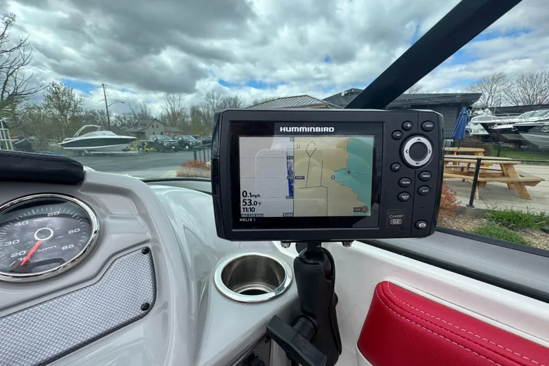 Slide: The Image of 2017 Chaparral 21 H2O Sport boat dashboard with Humminbird GPS and speedometer. - 25