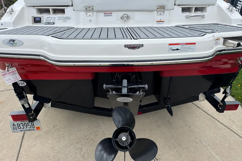 Slide: The Image of Rear view of a 2017 Chaparral 21 H2O Sport boat with winterized tag. - 6