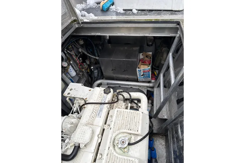 Slide: The Image of Engine compartment of a 2007 Armstrong Marine 36 Catamaran with visible machinery and equipment. - 22