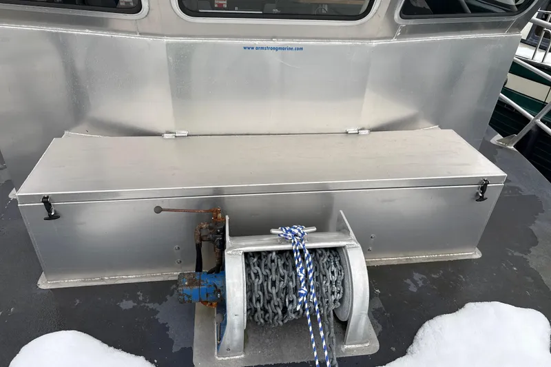Slide: The Image of 2007 Armstrong Marine 36 Catamaran deck with winch and storage compartment. - 27