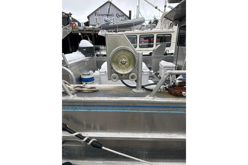 Slide: The Image of Armstrong Marine 36 Catamaran, 2007, docked at Fisherman's Quay with equipment visible. - 29