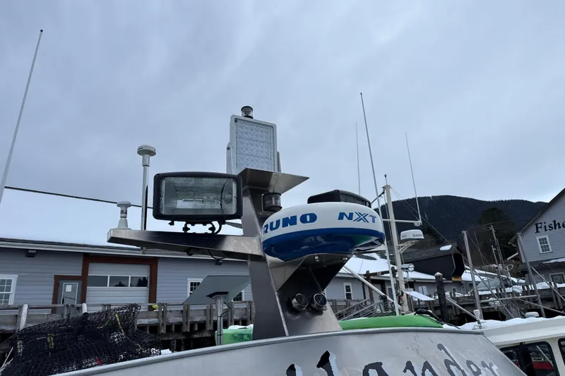 Slide: The Image of Radar and equipment on a 2007 Armstrong Marine 36 Catamaran at a dock. - 31