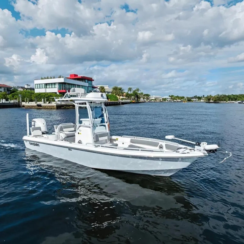 The Image of 2023 Everglades 243 Center Console boat on calm water. - 0
