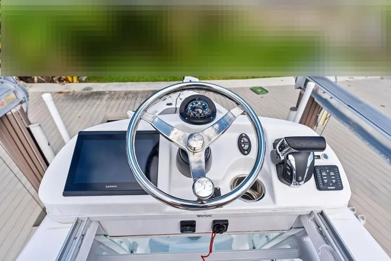 Slide: The Image of Steering console of Everglades 243 Center Console boat, 2023 model. - 26