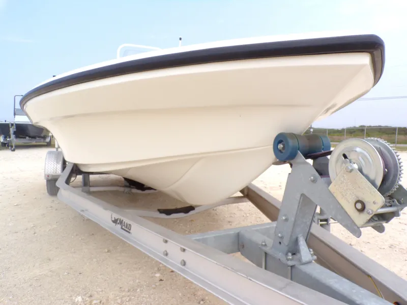 Slide: The Image of 2022 Mako 18 LTS boat on trailer, side view. - 5