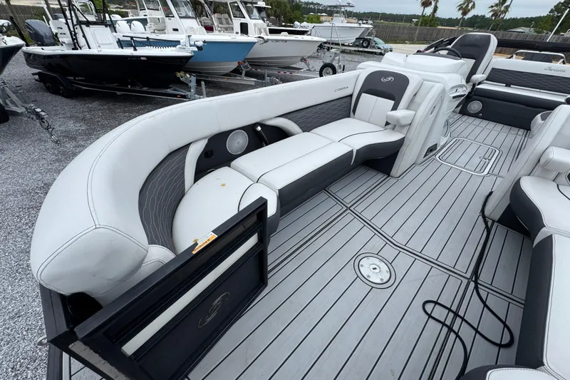 Slide: The Image of 2023 Barletta CORSA 25UC pontoon boat interior with sleek seating and modern design. - 17
