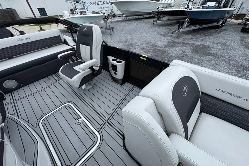 Slide: The Image of 2023 Barletta CORSA 25UC boat interior with sleek seating and modern design. - 20