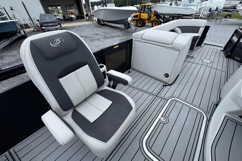 Slide: The Image of 2023 Barletta CORSA 25UC boat interior with luxurious seating and sleek design. - 26