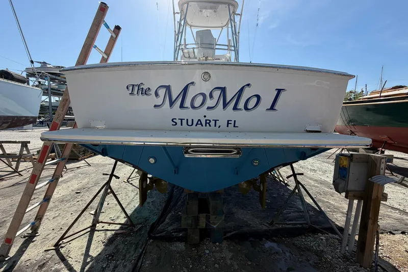 Slide: The Image of 1977 Bertram 31 Flybridge Cruiser, "The MoMo I," docked in Stuart, FL. - 6