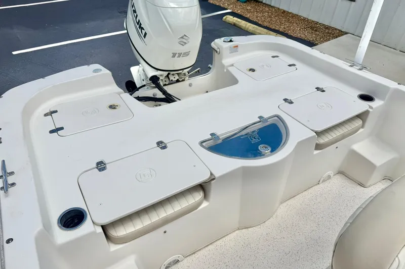 Slide: The Image of 2019 Carolina Skiff 198 DLV boat with Suzuki 115 outboard motor. - 23