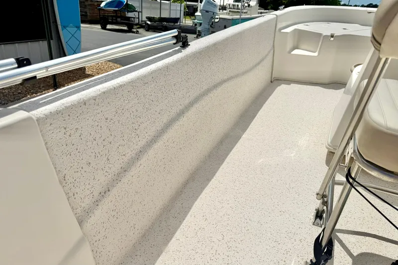Slide: The Image of 2019 Carolina Skiff 198 DLV boat interior with textured flooring and seating. - 30