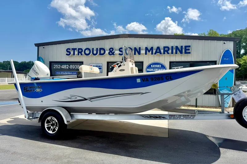Slide: The Image of 2019 Carolina Skiff 198 DLV boat on trailer at Stroud & Son Marine dealership. - 6
