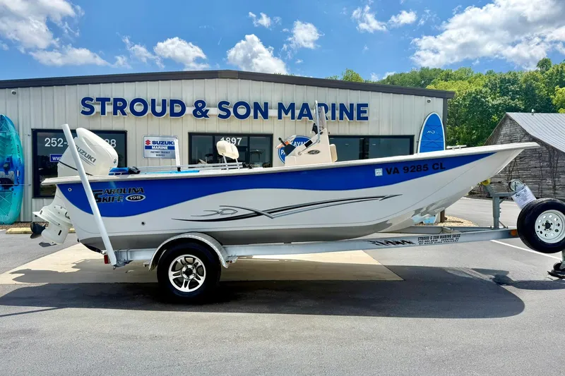 Slide: The Image of 2019 Carolina Skiff 198 DLV boat on trailer at Stroud & Son Marine dealership. - 7