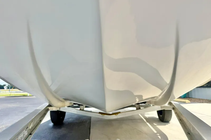Slide: The Image of 2019 Carolina Skiff 198 DLV boat hull on trailer, close-up view. - 9