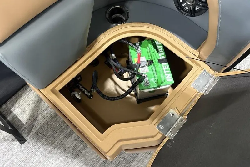 Slide: The Image of Battery compartment of 2026 Godfrey Sweetwater 2286 QS pontoon boat, featuring Interstate battery. - 25