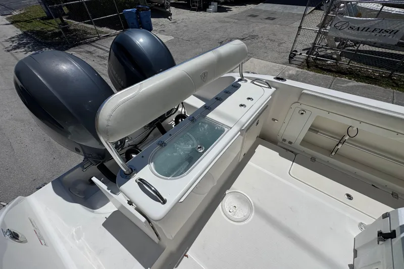 Slide: The Image of 2022 Century 2600 Center Console boat with dual engines and fishing amenities. - 16