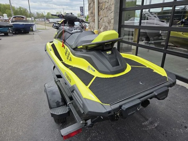 Slide: The Image of 2023 Yamaha WaveRunner VX Cruiser HO on trailer, yellow-black, side view. - 5