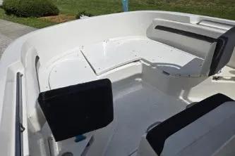 Slide: The Image of 2023 Trophy T22 boat interior with seating and storage compartments. - 9