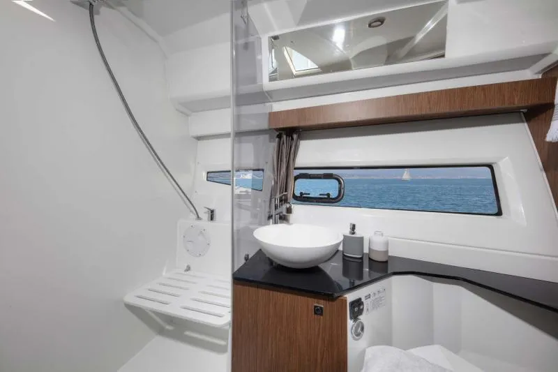 Slide: The Image of Interior view of Jeanneau NC 1095 yacht bathroom, 2022 model. - 23