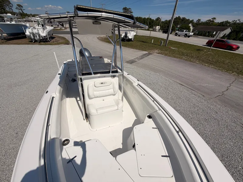 Slide: The Image of 2016 Sea Hunt Triton 225 boat displayed in parking lot. - 11