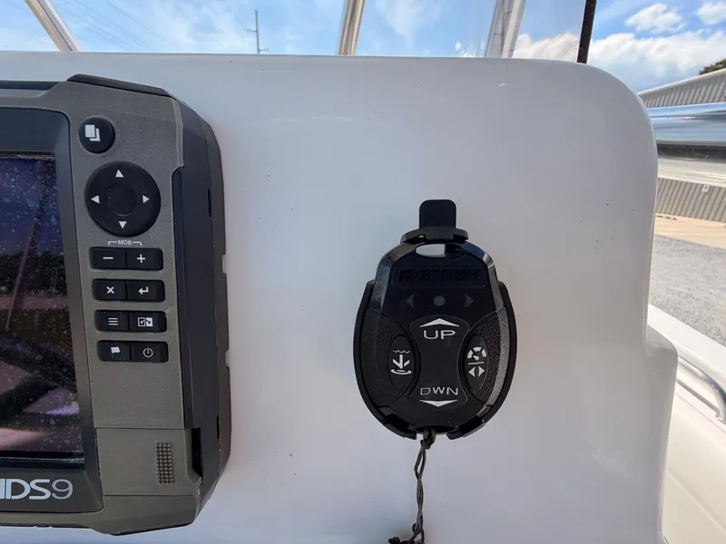 Slide: The Image of Control console of a 2016 Sea Hunt Triton 225 boat. - 14