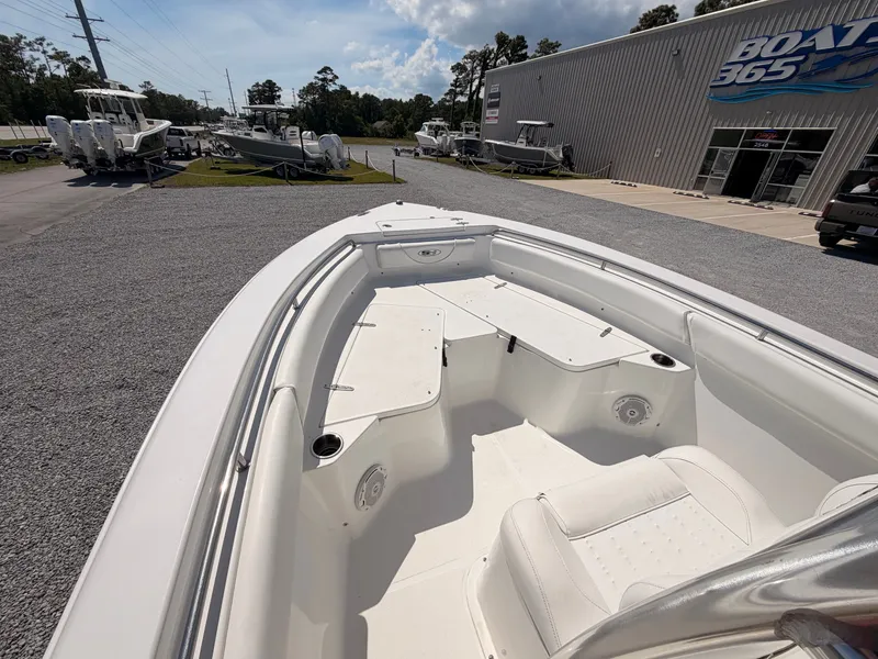 Slide: The Image of 2016 Sea Hunt Triton 225 boat at a dealership, Boat 365. - 9